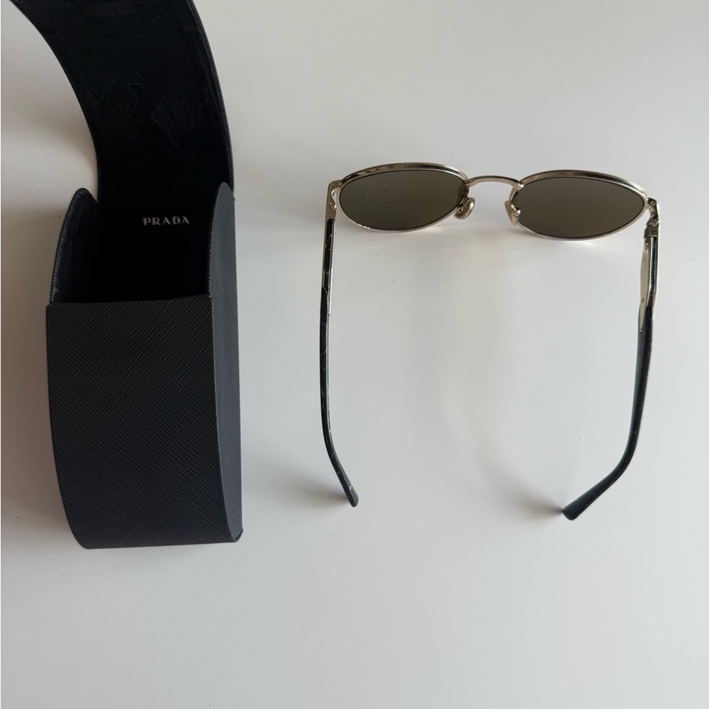 Prada Black and Gold Sunglasses with Sleek Design